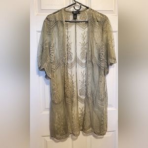 Light green Lace Cardigan top to be worn over a dress or other top. Bell sleeves